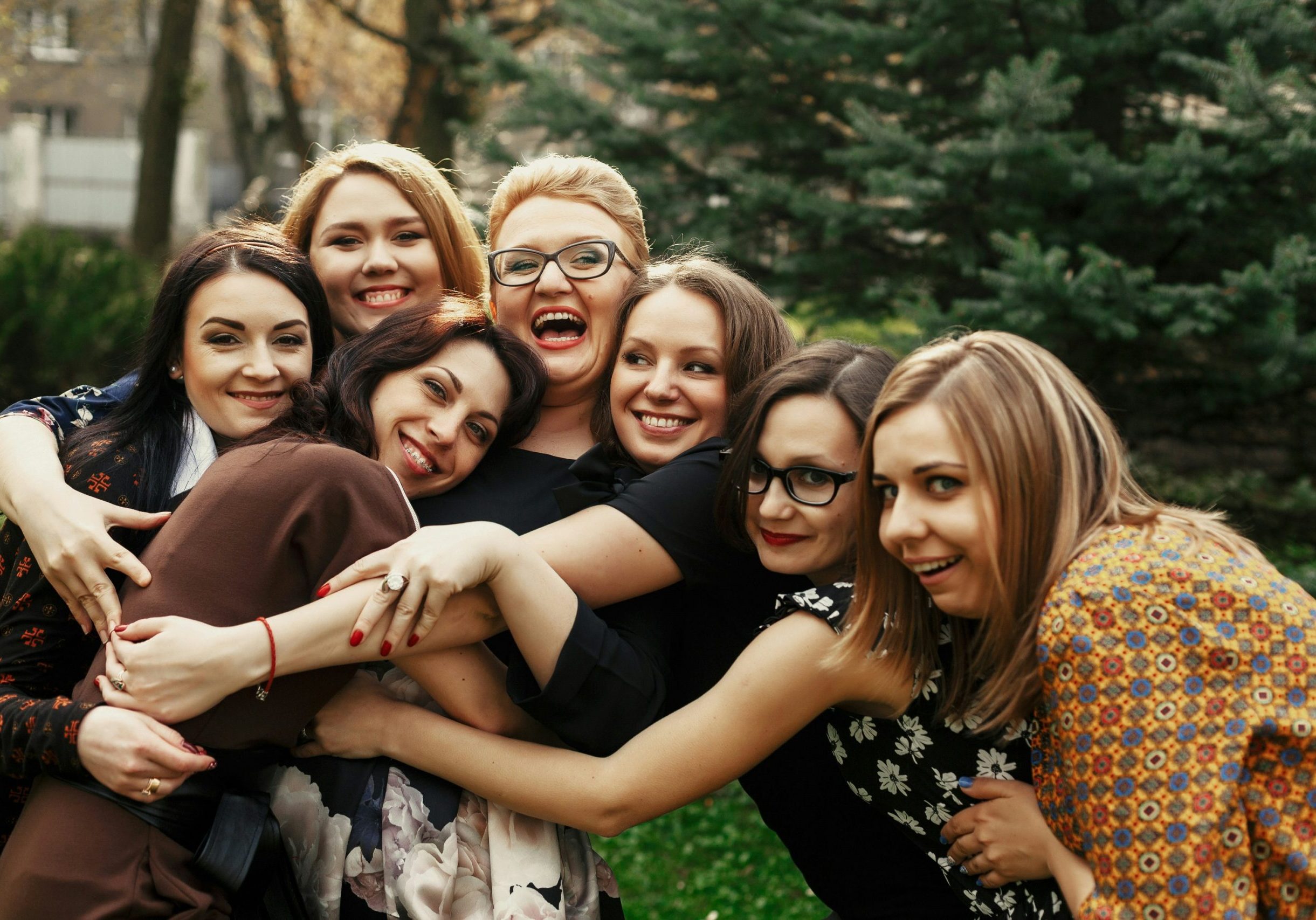 Group of friends hugging.